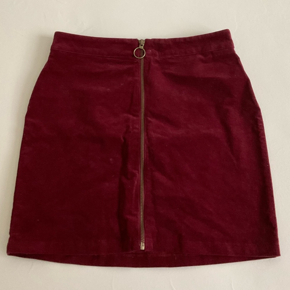 A red velvet skirt
